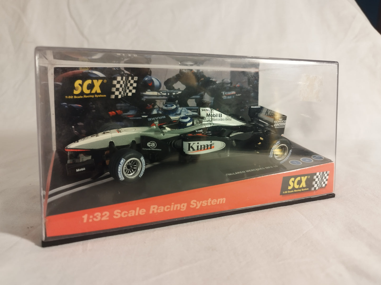SCX Scalextric McLaren Mercedes MP4-16 Kimi Raikonnen 1/32 Slot Car