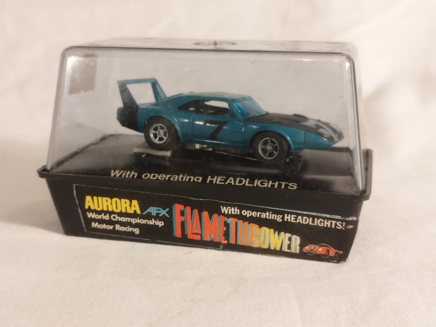 Aurora AFX Flamethrowers Plymouth Superbird "7" with Headlights - Mint Boxed